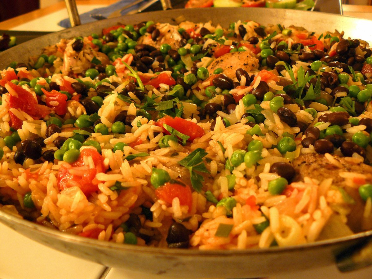stuff-yourself-with-a-hearty-and-flavorful-meal-of-arroz-con-pollo-rice-mixed-with-chicken-vegetables-and-black-beans-in-havana