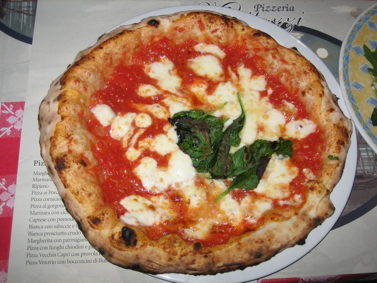 bite-into-a-chewy-gooey-slice-of-neapolitan-style-pizza-in-naples-italy