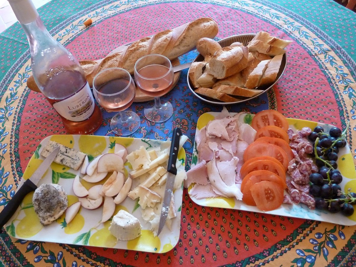 take-part-in-a-de-rigeur-french-ritual-picnic-with-a-fresh-loaf-of-crusty-bread-soft-cheeses-charcuterie-and-a-crisp-bottle-of-chilled-ros-in-the-south-of-france
