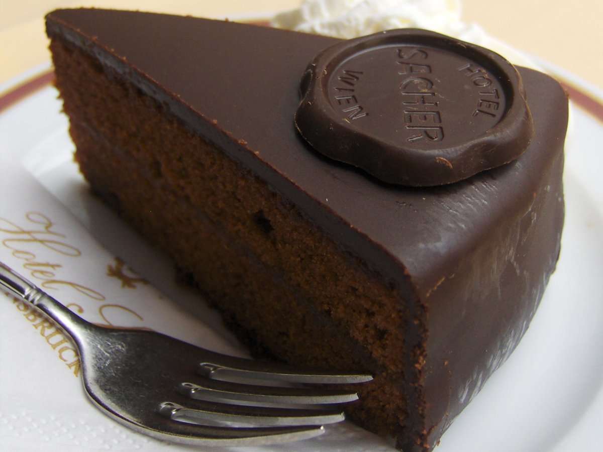 treat-yourself-to-a-sachertorte--a-rich-dense-chocolate-cake--in-vienna-the-city-is-renowned-for-its-elegant-and-historic-pastry-shops-like-cafe-landtmann-and-demel